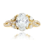 Twisted cluster engagemennt ring OVAL center 1.58ct